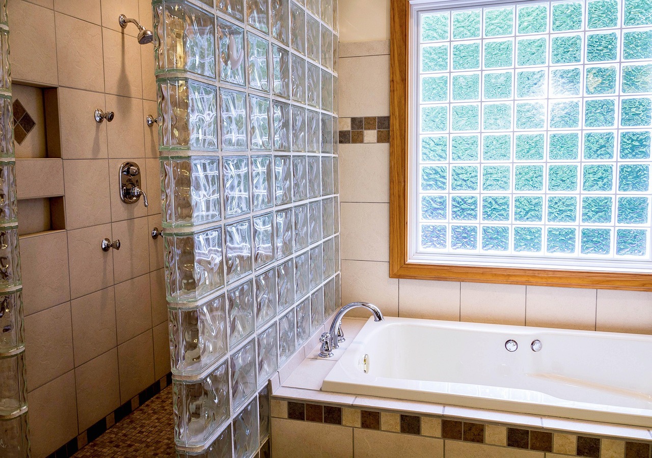 Modern luxury bathroom with spa bathtub and elegant tiles