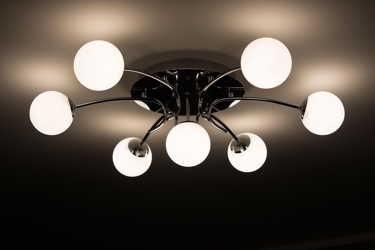 Dining room with pendant chandelier and modern lighting