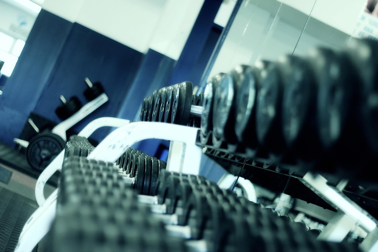 Home gym with weight equipment and rubber flooring