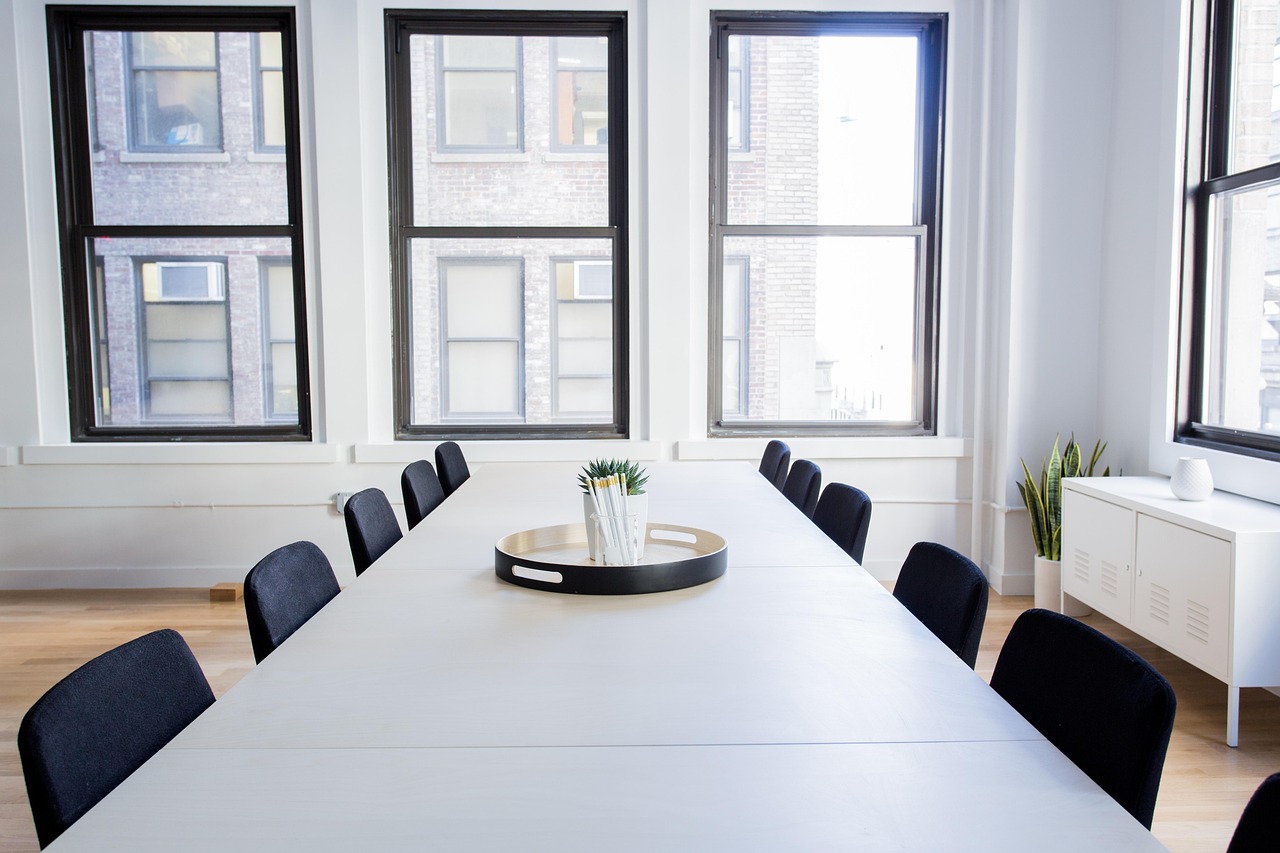 Well-lit office meeting room with natural light